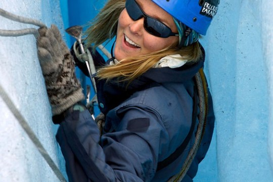 a person wearing a hat and sunglasses
