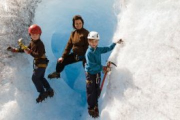 a group of people that are standing in the snow