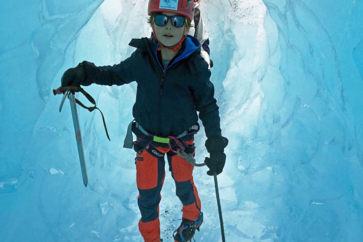 a person skiing down a snow covered mountain