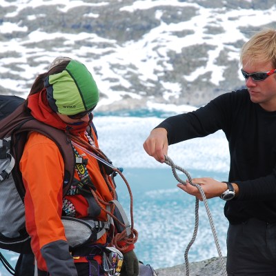 a person that is standing in the snow