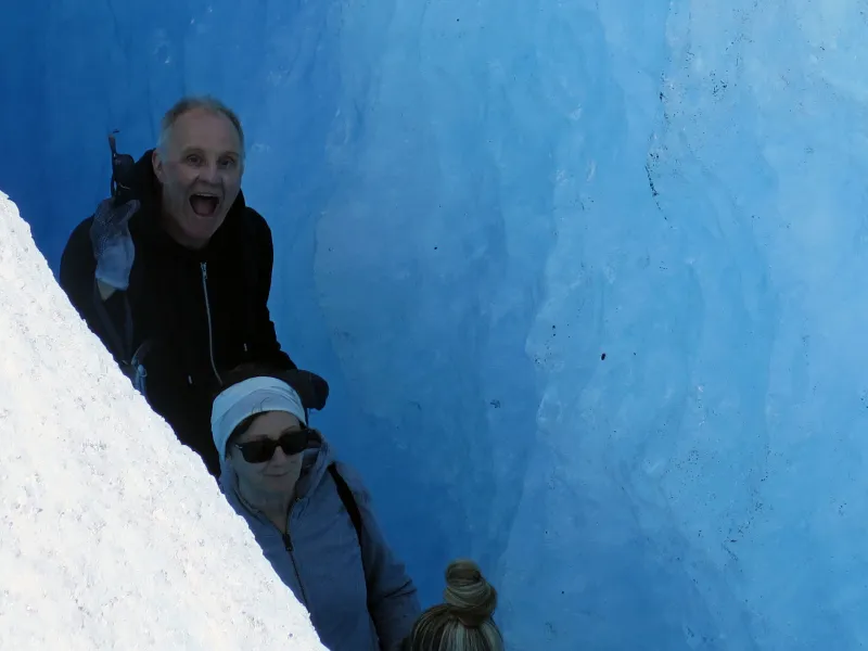 a person that is standing in the snow